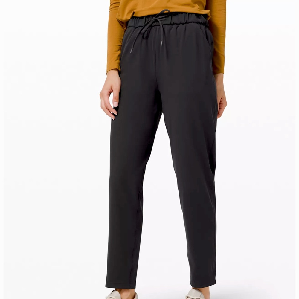 Lululemon Size 12. Stretch High Rise 7/8 Length Pant 25". Olive Color.